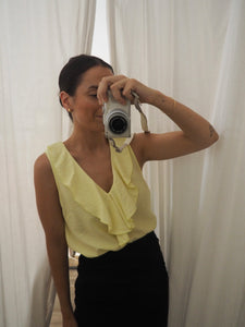Blusa volante amarilla