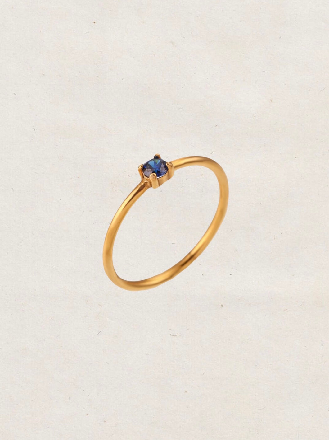 Anillo solitario circonita zafiro  - Acero dorado 316L baño oro 18k - Talla 16