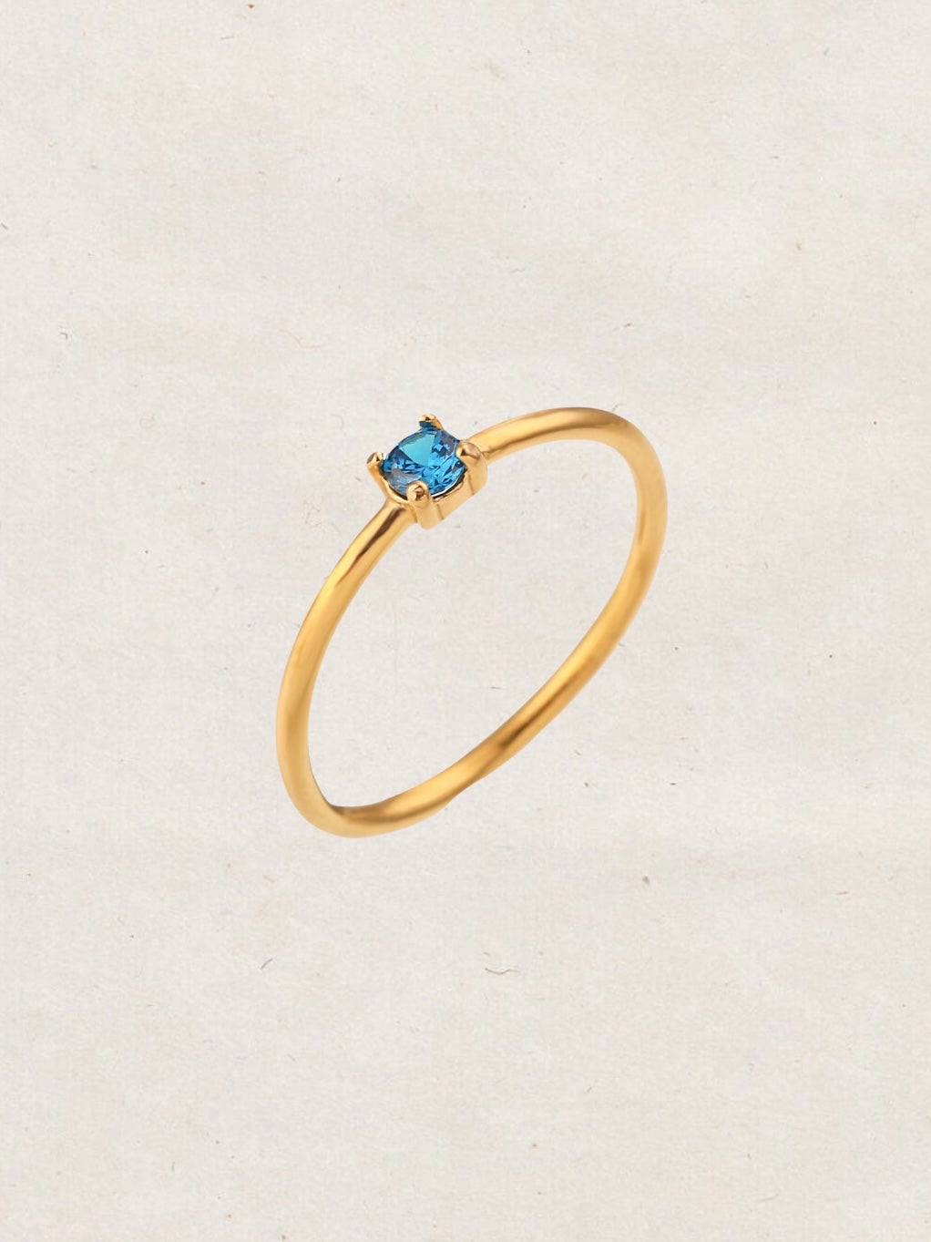 Anillo solitario circonita azul - Acero dorado 316L baño oro 18k - Talla 14 y 16
