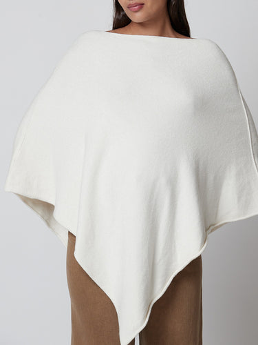 Poncho punto blanco roto
