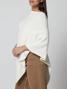 Poncho punto blanco roto