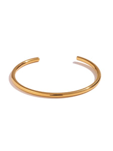 Pulsera esclava · Acero dorado 316L baño oro 18k
