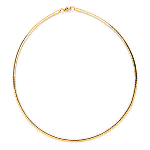 Collar semi rígido • Acero dorado 316L baño oro 18k